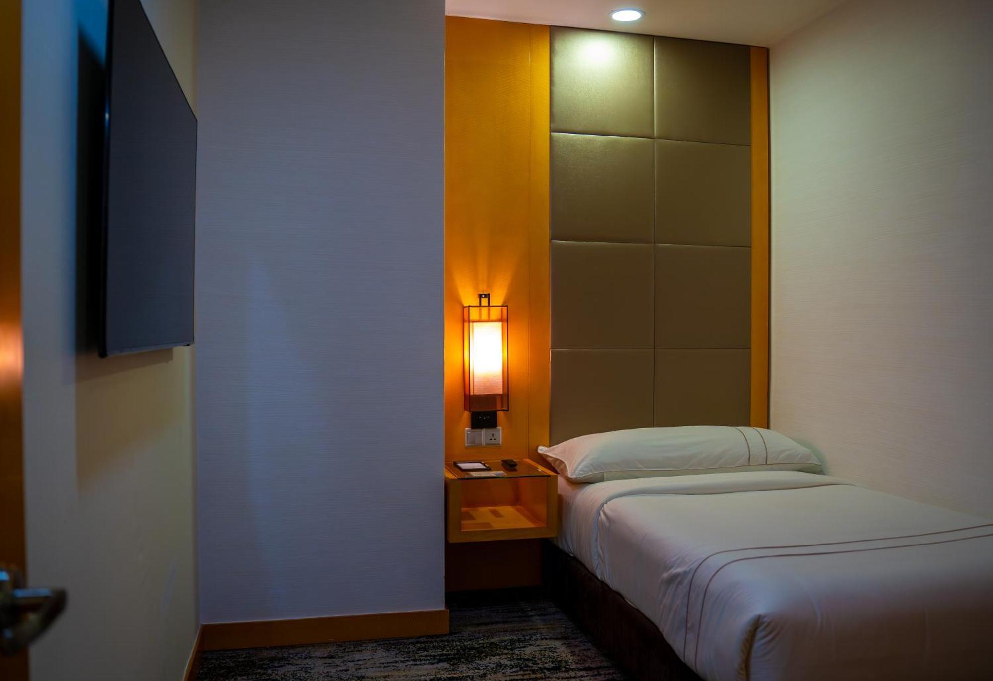The Waterfront Hotel Kuching Exteriör bild A room at the hotel
