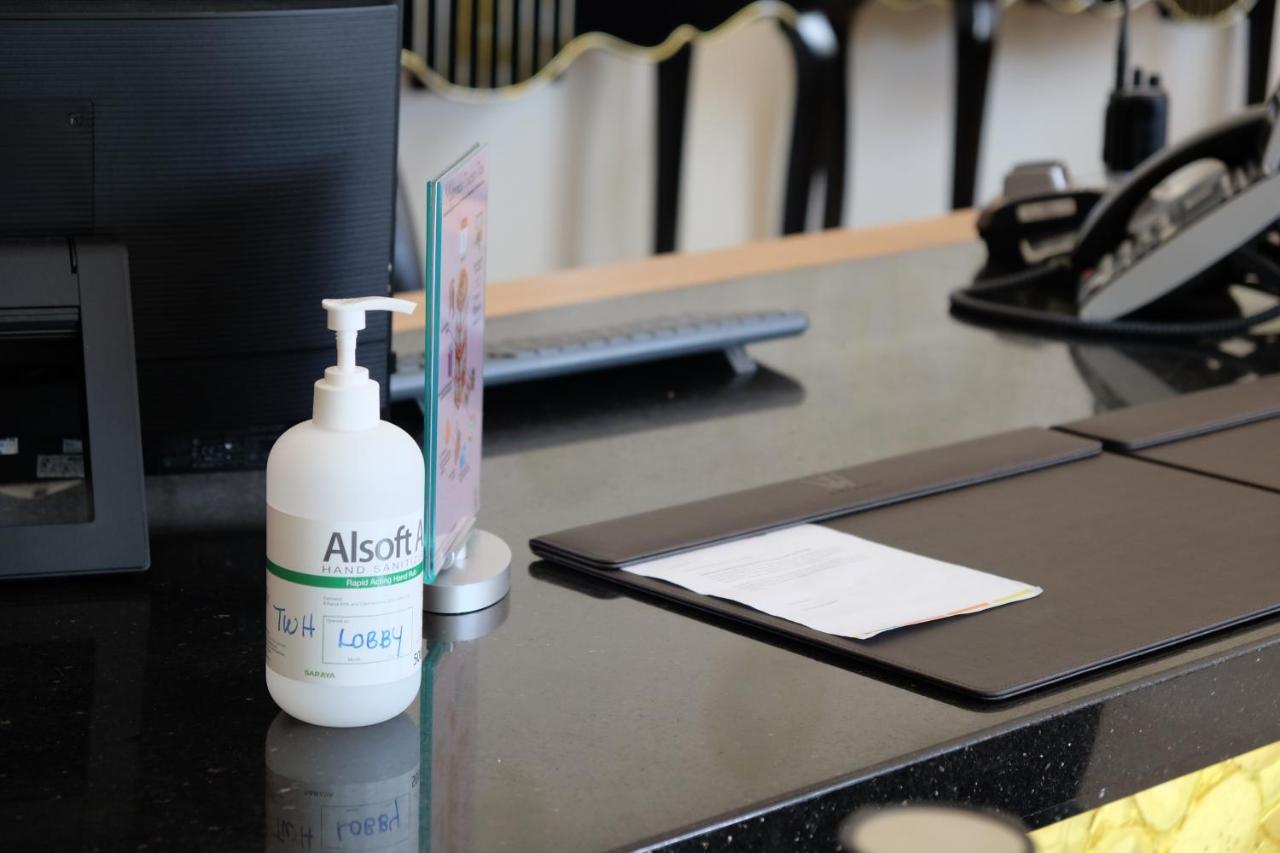 The Waterfront Hotel Kuching Exteriör bild A bottle of hand sanitizer